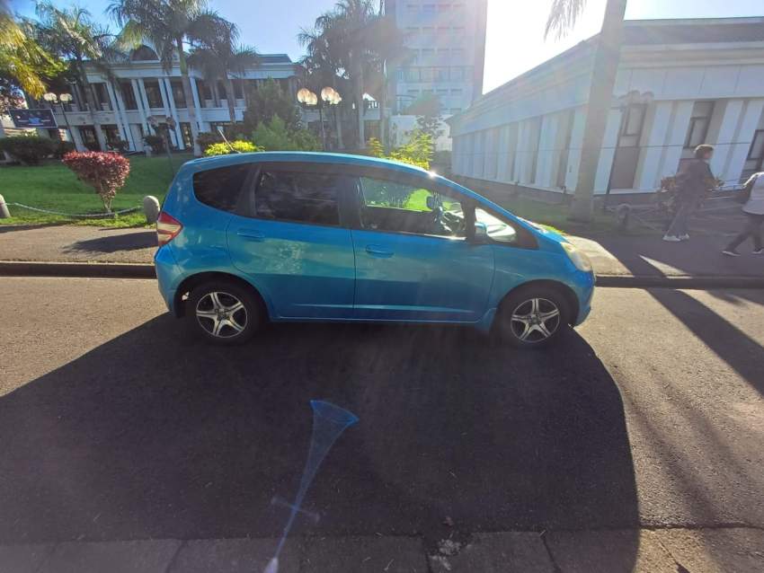 Honda Fit 09 - 2 - Family Cars  on Aster Vender