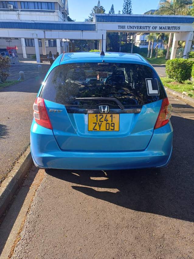 Honda Fit 09 - 1 - Family Cars  on Aster Vender