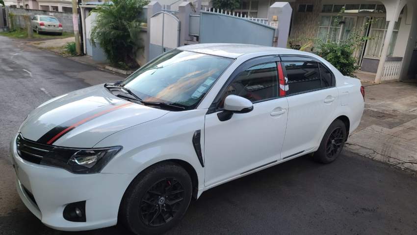 Toyota Axio 2012 - 1 - Family Cars  on Aster Vender