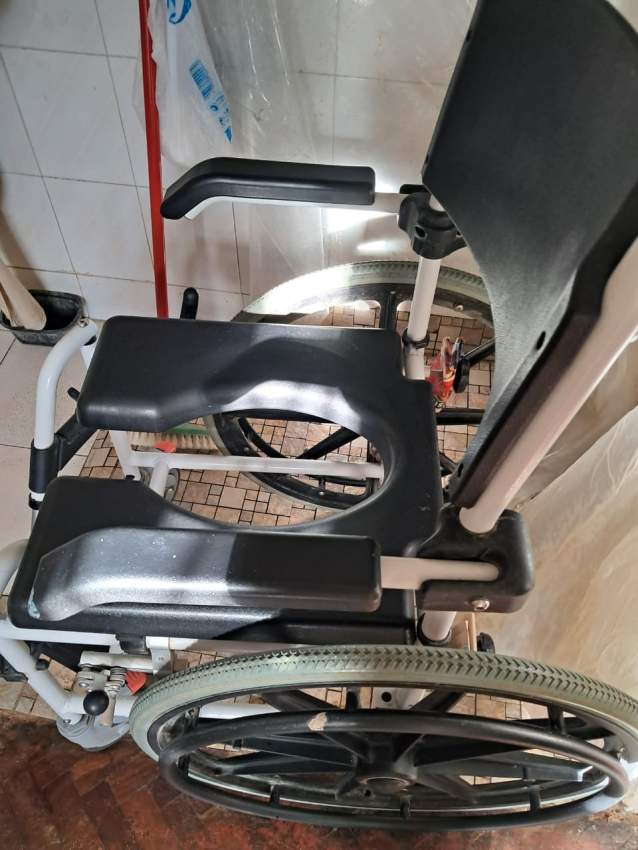 Wheelchair with 4 features - 1 - Wheelchair  on Aster Vender