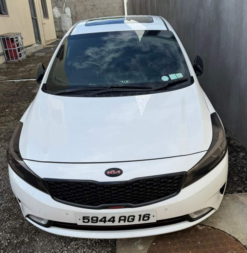 Kia Cerato - Pearl White (Aug 2016) - 1 - Family Cars  on Aster Vender