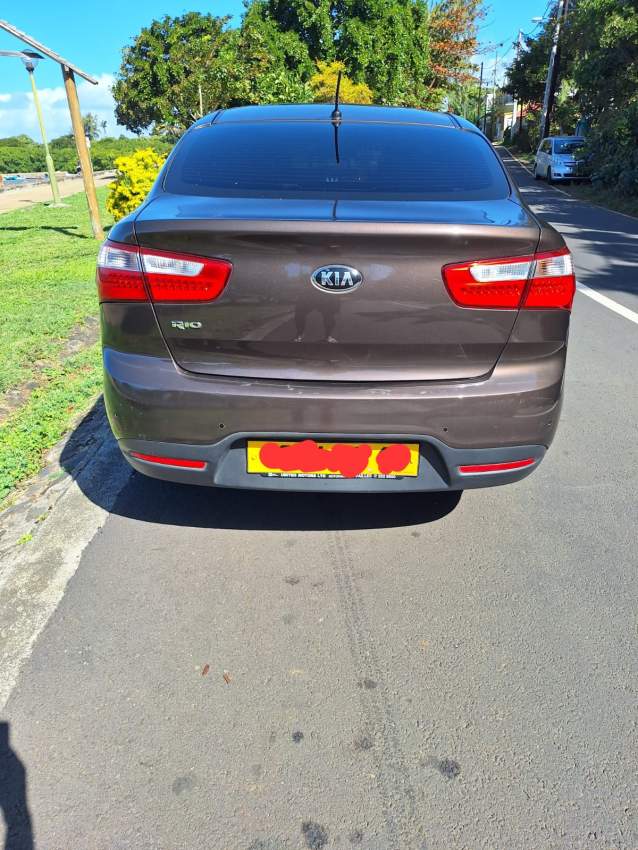 2014 Kia Rio Sedan - 2 - Family Cars  on Aster Vender