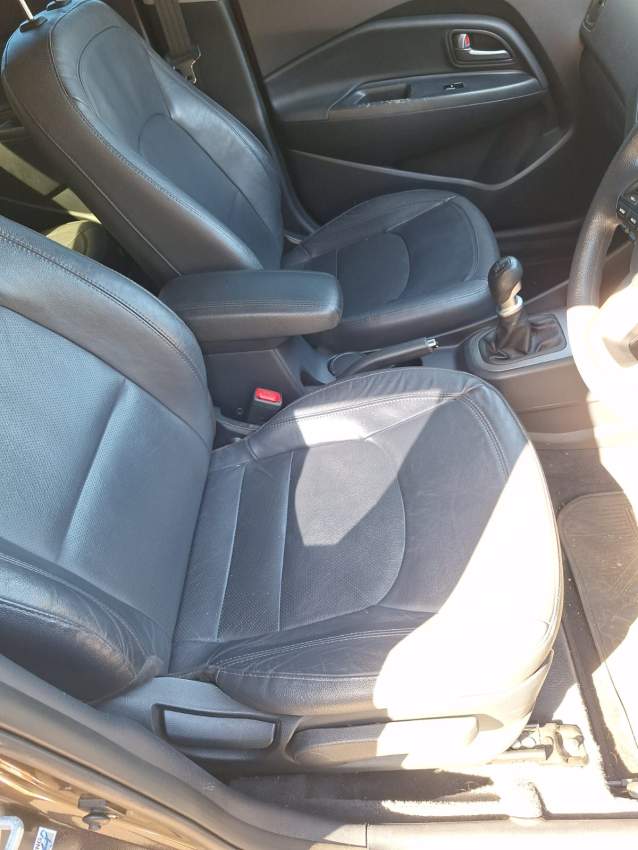 2014 Kia Rio Sedan - 4 - Family Cars  on Aster Vender