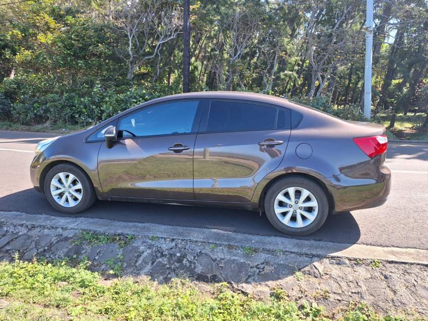2014 Kia Rio Sedan - 1 - Family Cars  on Aster Vender