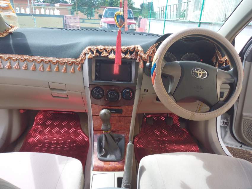 Car Axio Grade G Manuel - 2 - Family Cars  on Aster Vender