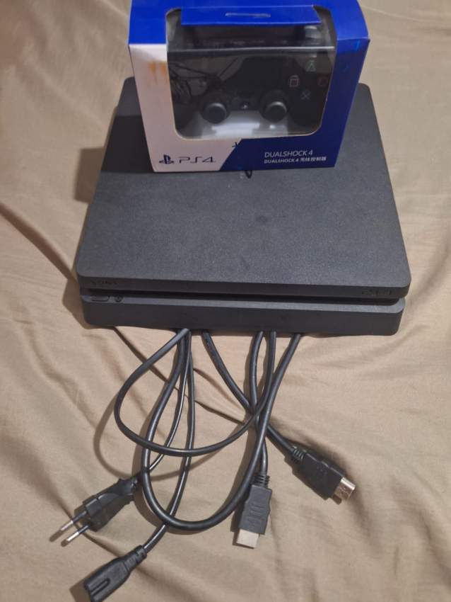 USED 1TB PS4 SLIM WITH CONTROLLER AND 7 FREE GAMES - 1 - PlayStation 4 Games  on Aster Vender