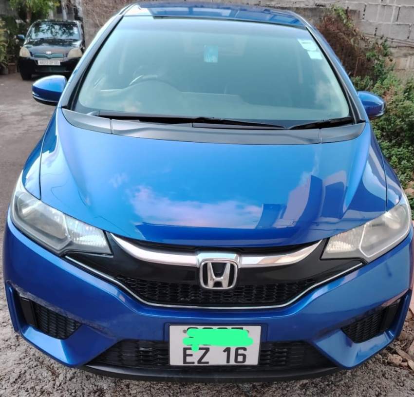 Honda Fit - Blue - 1 - Family Cars  on Aster Vender