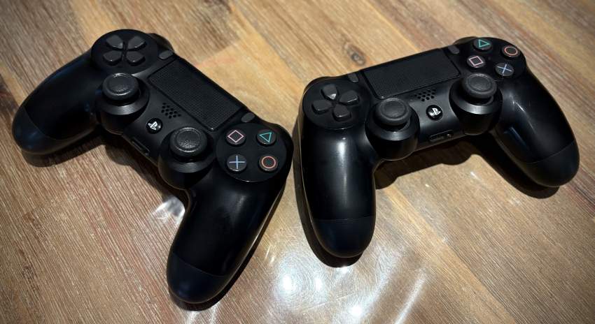 PS4 Slim 1 Tb+2 Controllers+ 2 games - Quality: 10/10 - 1 - PlayStation 4 (PS4)  on Aster Vender