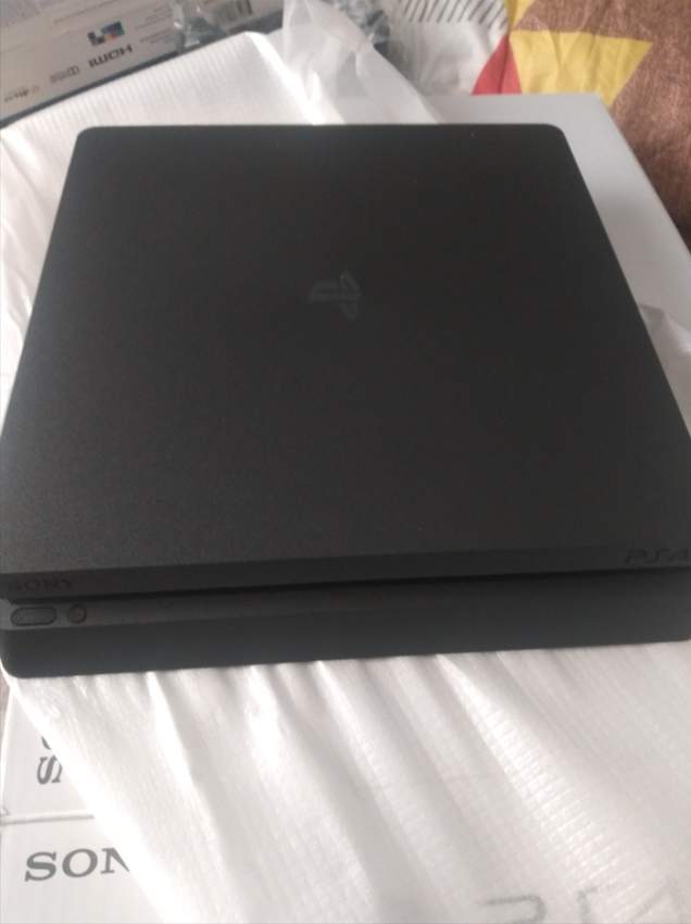 NEW PS4 SLIM 1TB - 4 - PlayStation 4 Games  on Aster Vender