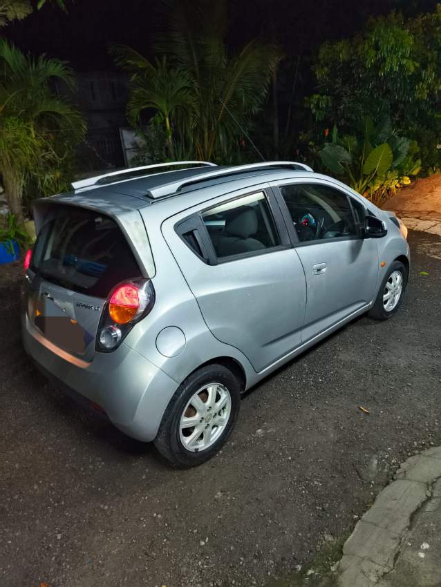 Chevrolet spark - 5 - Family Cars  on Aster Vender