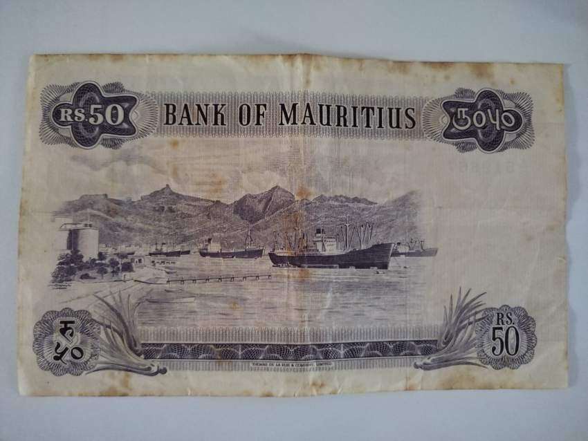 Queen Elizabeth II Mauritius Bank - 4 - Banknotes  on Aster Vender