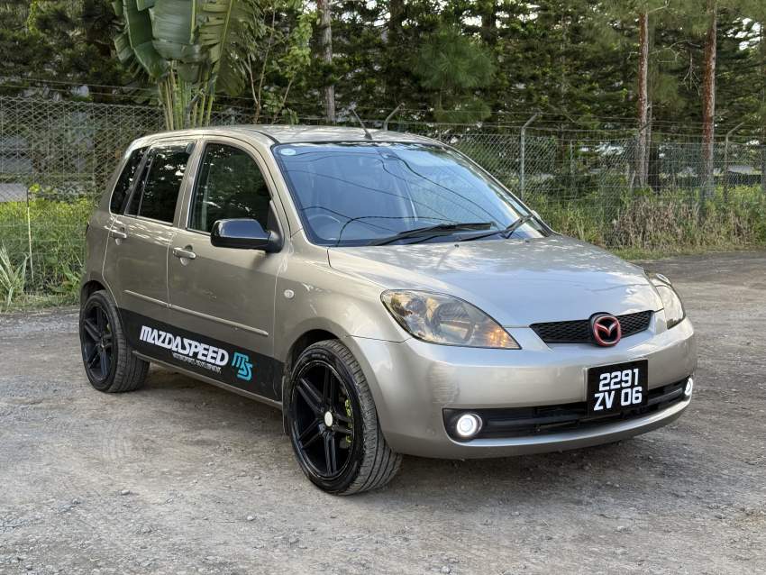 Mazda Demio ZV 06 - 1 - Family Cars  on Aster Vender