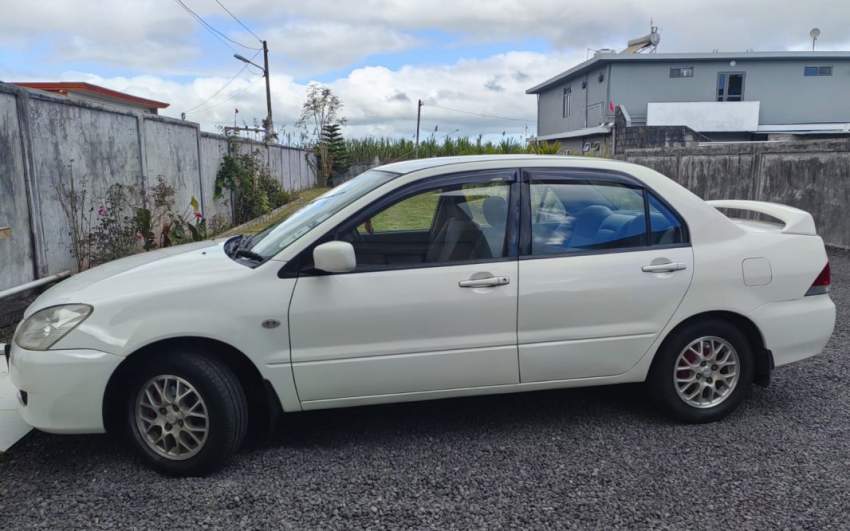 Mitsubishi Lancer 2005 - 1 - Family Cars  on Aster Vender