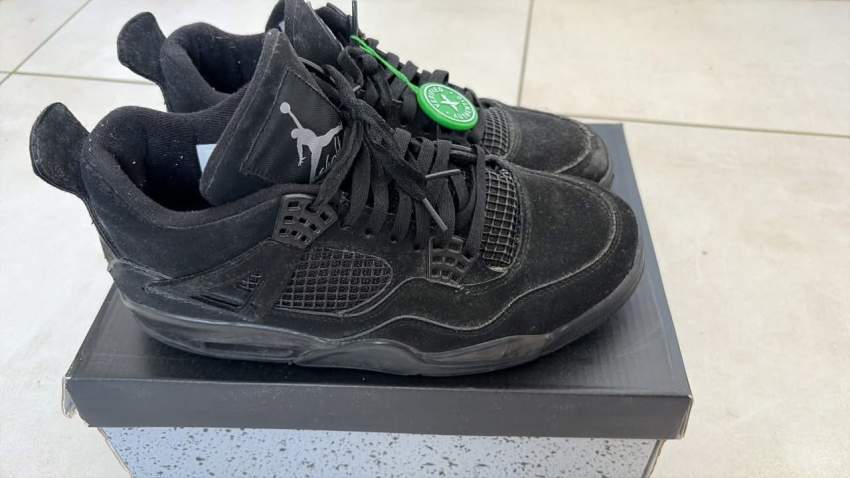 Jordan 4 black cat