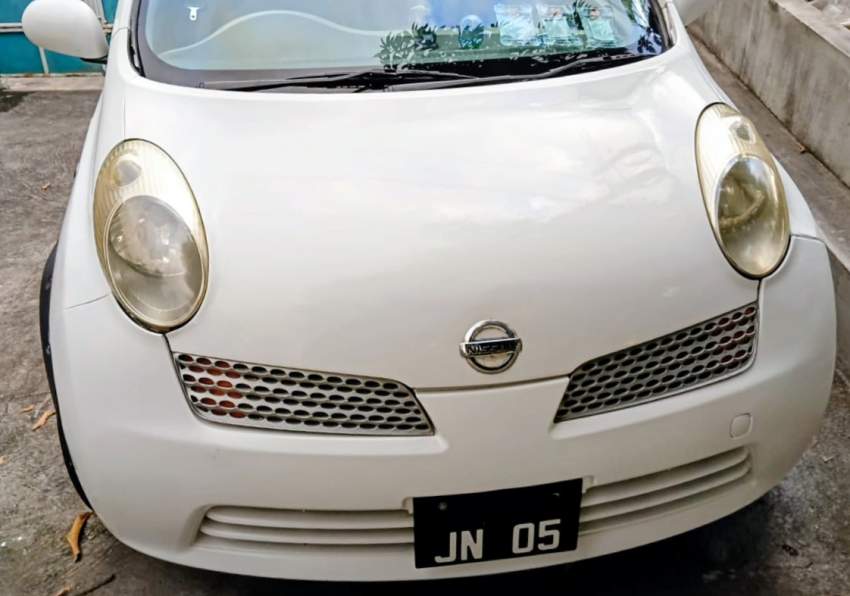 Nissan March - O5 - 4 - Compact cars  on Aster Vender