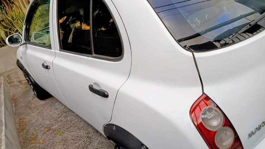 Nissan March - O5 - 5 - Compact cars  on Aster Vender