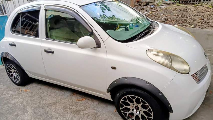 Nissan March - O5 - 2 - Compact cars  on Aster Vender