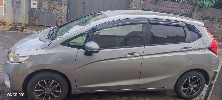 Honda Fit 2016 non hybrid - 1 - Family Cars  on Aster Vender