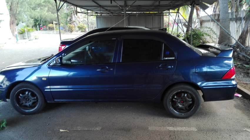 Mitshubishi lancer  - 1 - Sport Cars  on Aster Vender