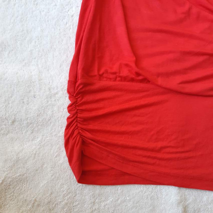 Red sleeveless top with pearls and laced sleeves - 1 - Tops (Women)  on Aster Vender