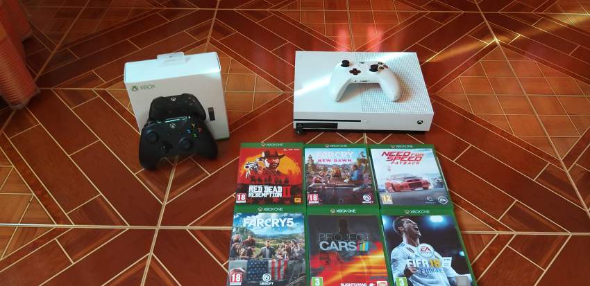 Xbox one 1 TB +6 GAMES+2 CONTROLLERS + 1 GAMING WHEEL on Aster Vender